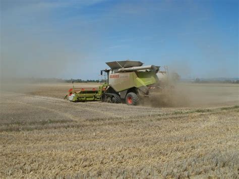 Free Photos: Machine harvesting the corn field | publicdomain