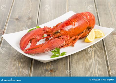 Lobster with Lemon Wedges. stock photo. Image of boiled - 31968386