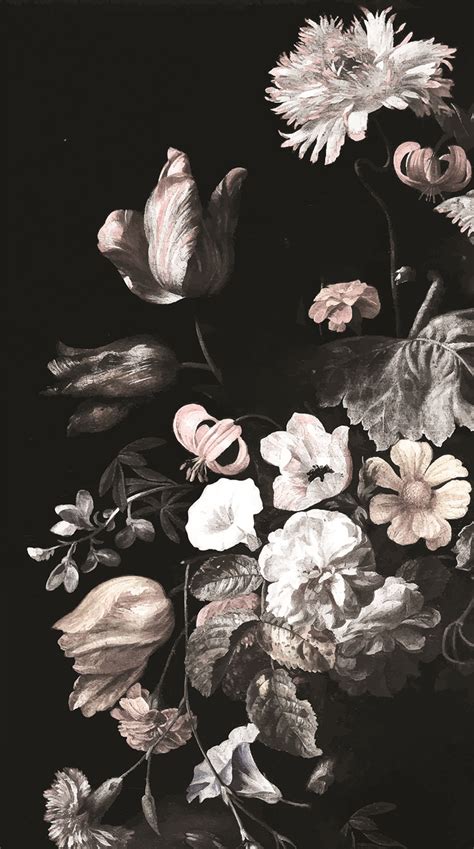 a black and white photo with flowers on it