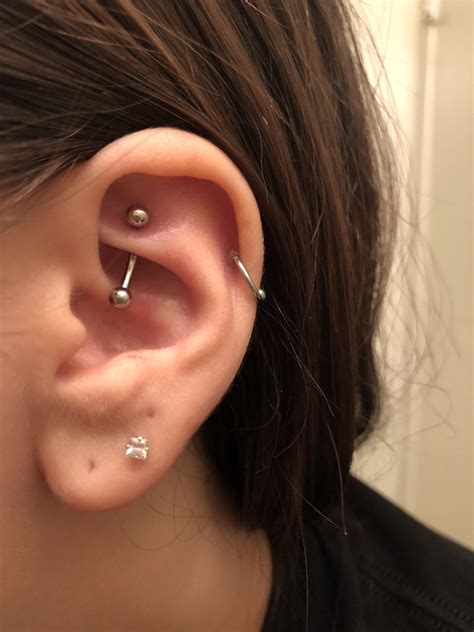 Just got my rook pierced today :) what else should I add to this ear ...