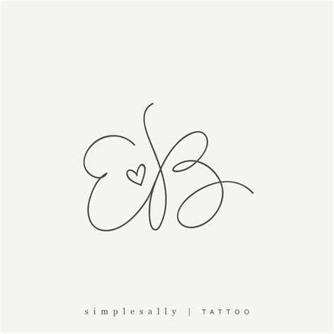 the letter e is inscribed in cursive handwriting with a heart on it's side