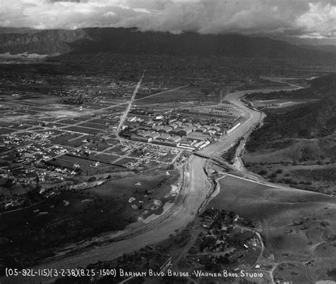 An aerial view of Toluca Lake and Burbank as the waters of the Los Angeles River overflow its ...