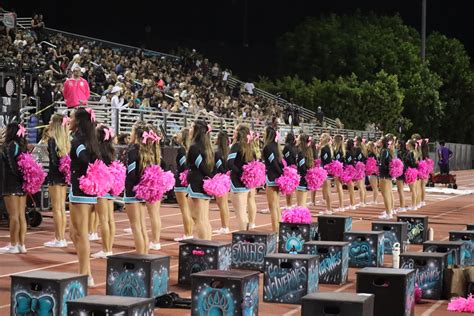 Pep Squad Cheers on Football – The Growling Wolverine