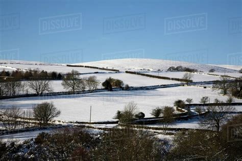 South Yorkshire, England; The Countryside Covered In Snow - Stock Photo - Dissolve