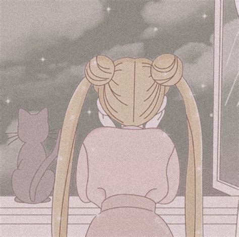 the back of a woman's head with long blonde hair, sitting in front of a window next to a cat