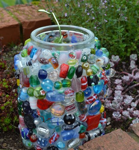 Glass bead Lantern - It was great fun recycling my collection of broken beads onto a large jar ...