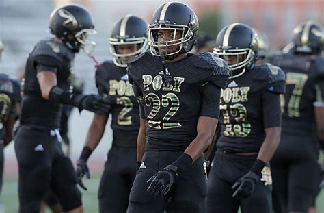 Photos: Long Beach Poly shows off football uniforms donated by Snoop Dogg - MaxPreps