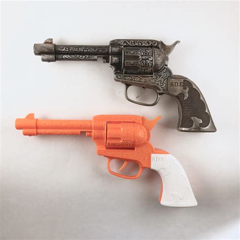 I've been turning toy guns into guns from my favorite video games & comics. Here is the ...