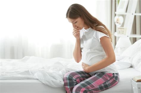 Premium Photo | Young pregnant woman suffering from morning sickness