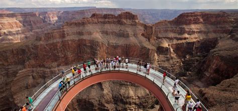 A glass bridge is suspended 4,000 feet above the Colorado River on the ...