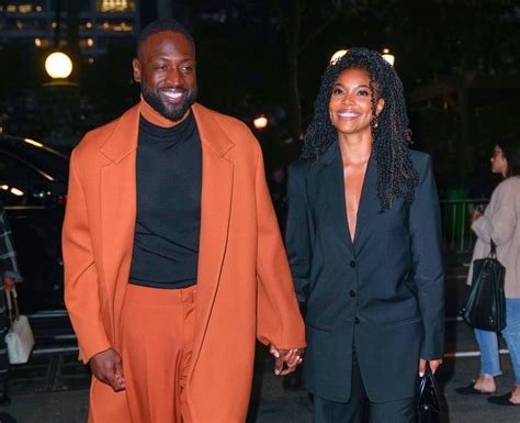 Gabrielle Union and Dwyane Wade Matching Pantsuits in NYC | POPSUGAR Fashion