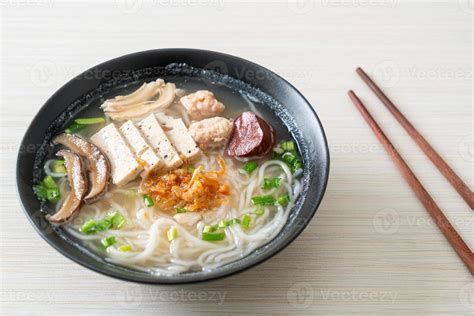 Vietnamese Rice Noodles Soup with Vietnamese Sausage served vegetables ...