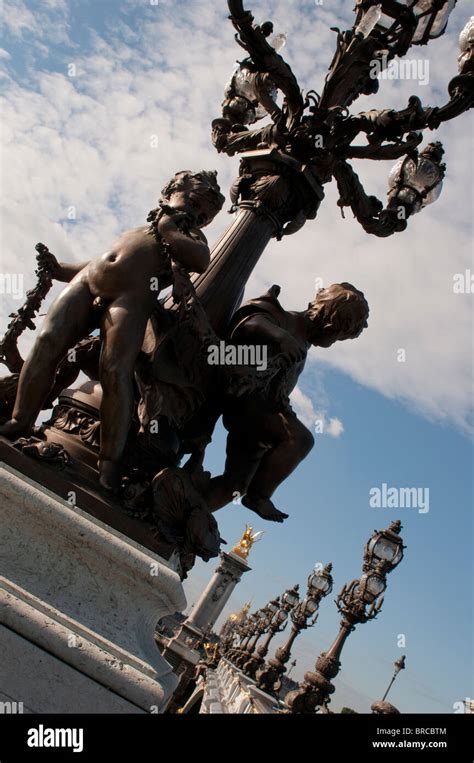 Statues and lampposts on Pont Alexandre III, Bridge of Alexander the ...