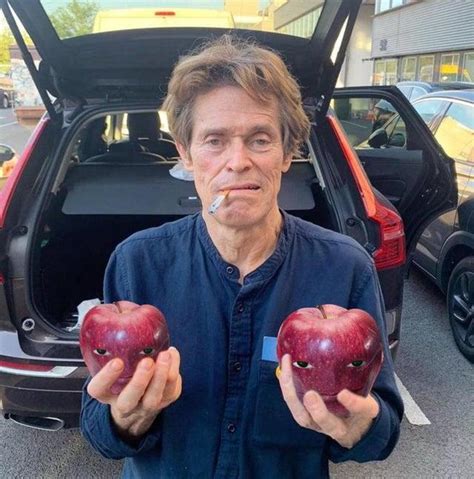 Willem DeFoe holding two Wapples | Apple With A Face / Wapple | Know ...