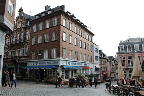 HD wallpaper: street, aachen, germany, tourists, old town, building exterior | Wallpaper Flare