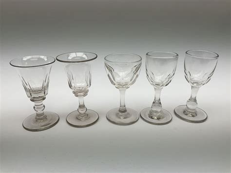 A collection of late Georgian/early Victorian glasses, to include custard cup, wine glass with ...