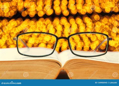 Reading Glasses on Book at Night Stock Image - Image of light, concept: 134906945