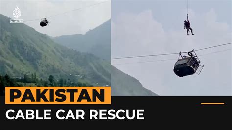 Rescue on after children trapped in cable car dangling over Pakistan ravine | News | Al Jazeera