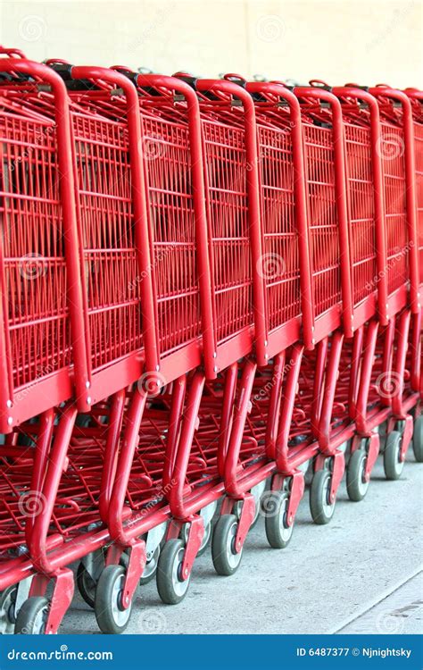 Row Of Red Metal Shopping Carts Royalty Free Stock Photography - Image: 6487377