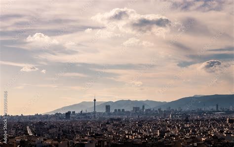 Tehran skyline in a beautiful cloudy day with golden hour light Tehran ...