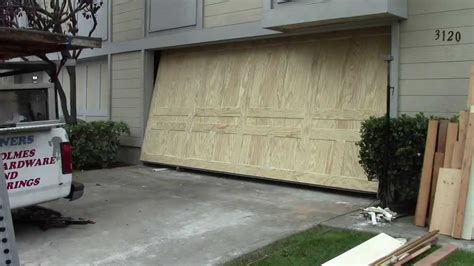 A wood one piece garage door - YouTube