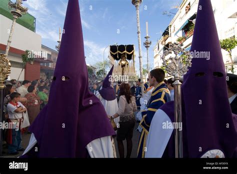 Penitents, Nazarenos during Holy Week (Semana Santa) processions in Malaga, Andalusia, Spain ...