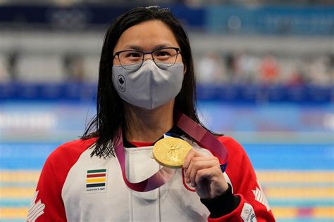 Mac Neil wins Canada's first gold of Tokyo 2020 in 100m butterfly ...