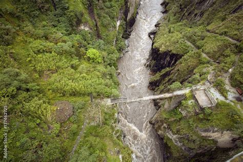 Dangerous bridge crossing the upper Rio Pastaza, Ecuador, on the ...