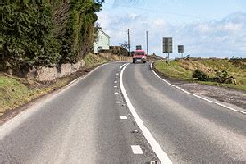 There are double white lines in the middle of the road. What does it mean when the line nearest ...