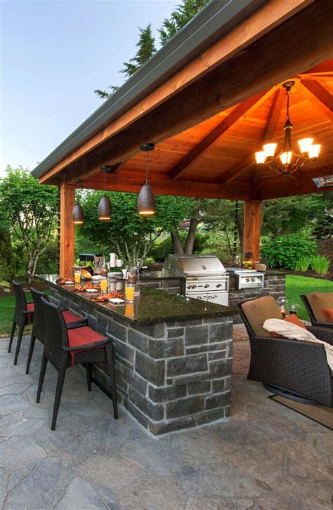 Outdoor Kitchen and Bar http://www.paradiserestored.com/landscaping-blog/happy-times-happy ...