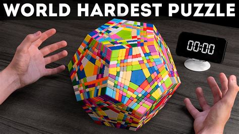 SOLVING THE HARDEST RUBIK’S CUBE IN THE WORLD | EXAMINX 11х11 - YouTube