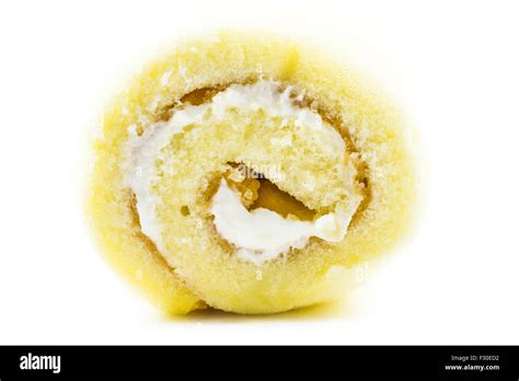 Jam roll cake with cream isolated on white background Stock Photo - Alamy