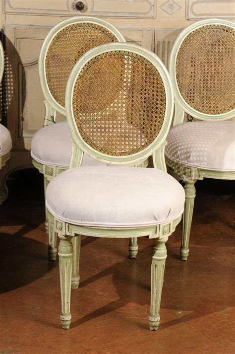 Set of Six French Louis XVI Style Painted Dining Chairs with Cane Backs, 1880s at 1stDibs