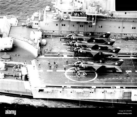 Port beam view of the Soviet Kiev class carrier MINSK (CVHG) underway with four Forger VTOL yak ...