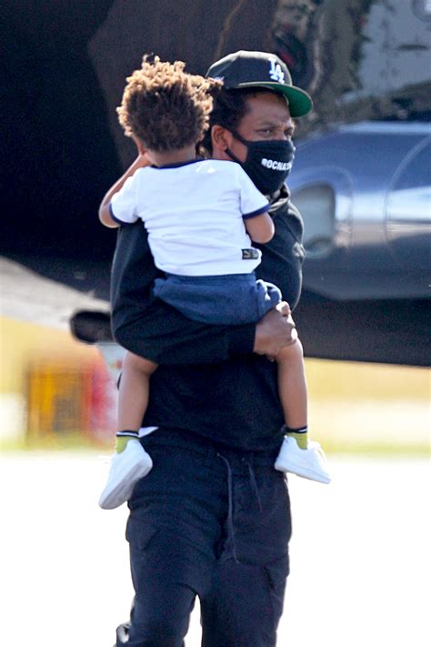 Beyonce and Jay-Z step off private plane in rare public outing with twins Rumi, Sir and daughter ...