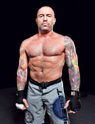 Joe Rogan's 2 Tattoos & Their Meanings - Body Art Guru