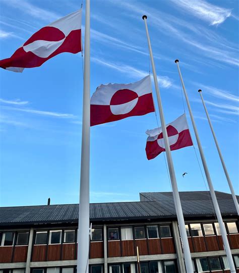 The official flag of Greenland flying at half-mast at Inatsisartut in ...