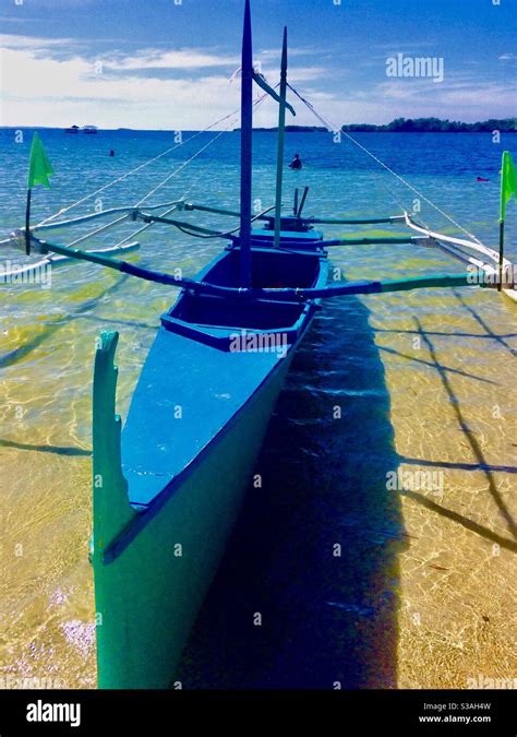 Bangka Boat on beach, Philippines Stock Photo - Alamy