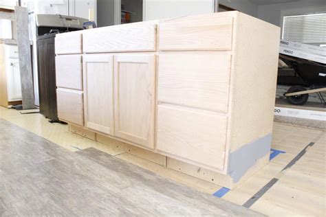 DIY kitchen island out of Home Depot stock cabinets. Cost less than $500! #kitchenisland ...