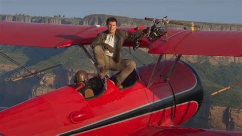 Tom Cruise Casually Stands On A Flying Plane In Mission: Impossible ...