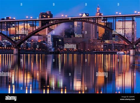 Saint Paul, Minnesota skyline and reflection at dusk with the Smith Ave ...