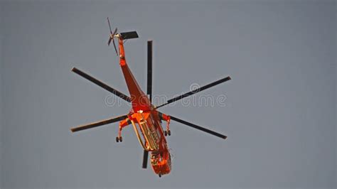 Erickson Air Crane Helicopter Taking Off after Filling with a Load of Water To Fight a Fire ...