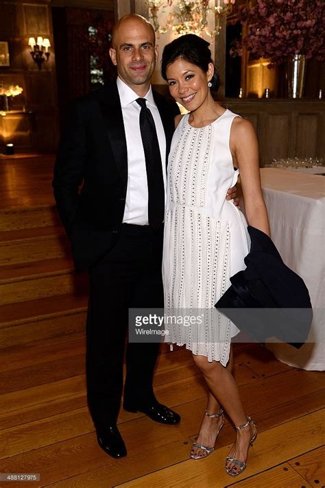 Sam Kass and Alex Wagner attend the Bloomberg & Vanity Fair cocktail... | Vanity fair, White ...