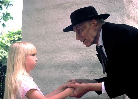 Heather O'Rourke as Carol Anne Freeling in Poltergeist II (1986) and Julian Beck, as Reverend ...