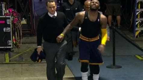 Kyrie Irving injury: Cavaliers star limps off in overtime vs. Warriors ...