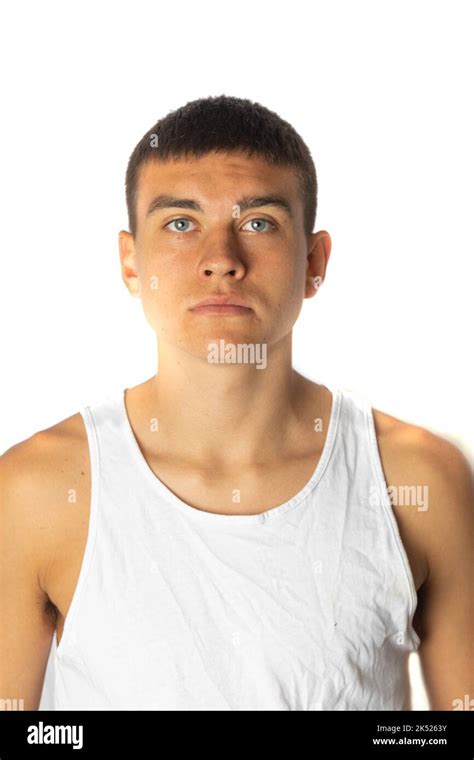 A portrait of a 19 year old teenage boy on a white background Stock Photo - Alamy