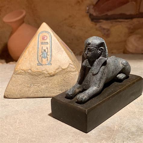 Egyptian-Replica-Sphinx-statue-with-Pyramid-featuring-Isis-knot-cartouche-Maat