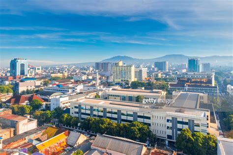 Urban Skyline Of The Densely Populated Bandung City In Java Island Indonesia Against A Blue Sky ...