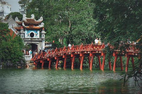 Thê Húc Bridge (literal meaning is Welcoming Morning Sunlight Bridge), Vietnam. First built in ...