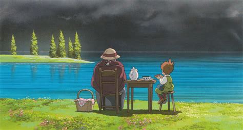 two people sitting at a table in front of a lake with dark clouds above them